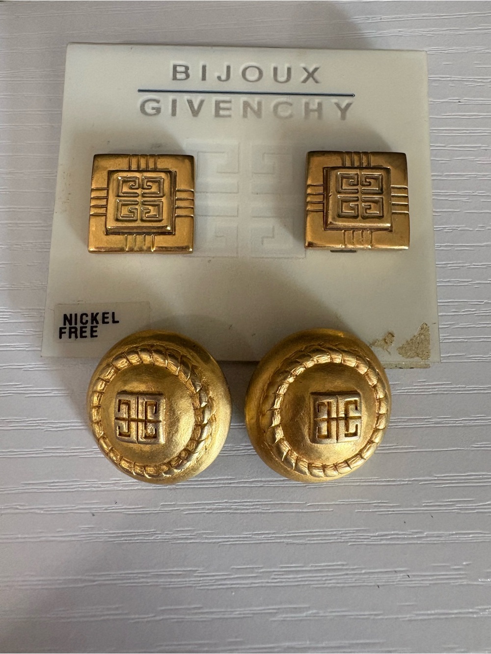 Givenchy 2 pair vintage clip on earrings gold tone 1/2” square & 1” round
